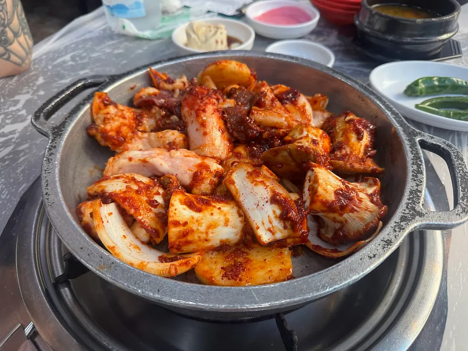 Hot soup served in an earthenware pot