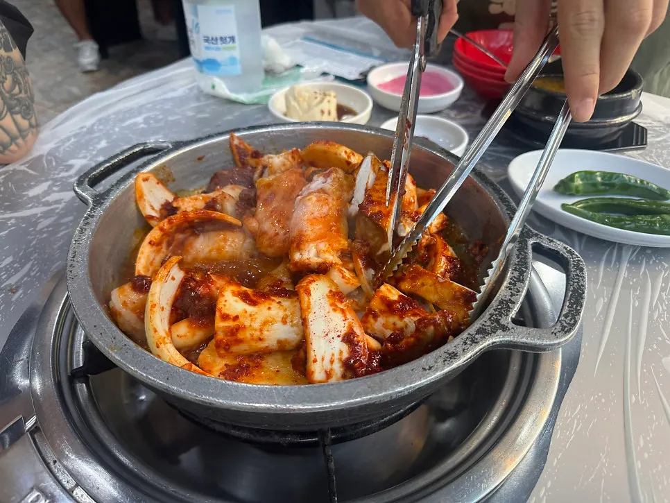 Large intestine, tripe, heart with king oyster mushrooms, onion, and potato