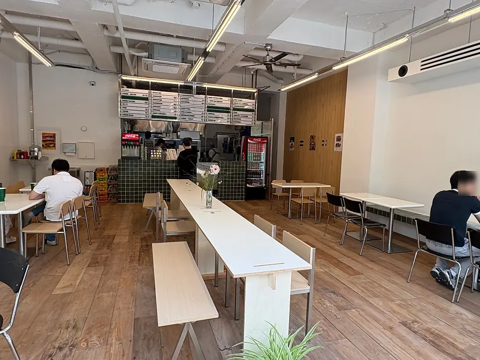 Interior with a long table in the center