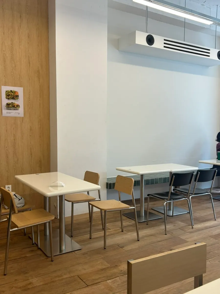 A clean, wood-toned corner of the store
