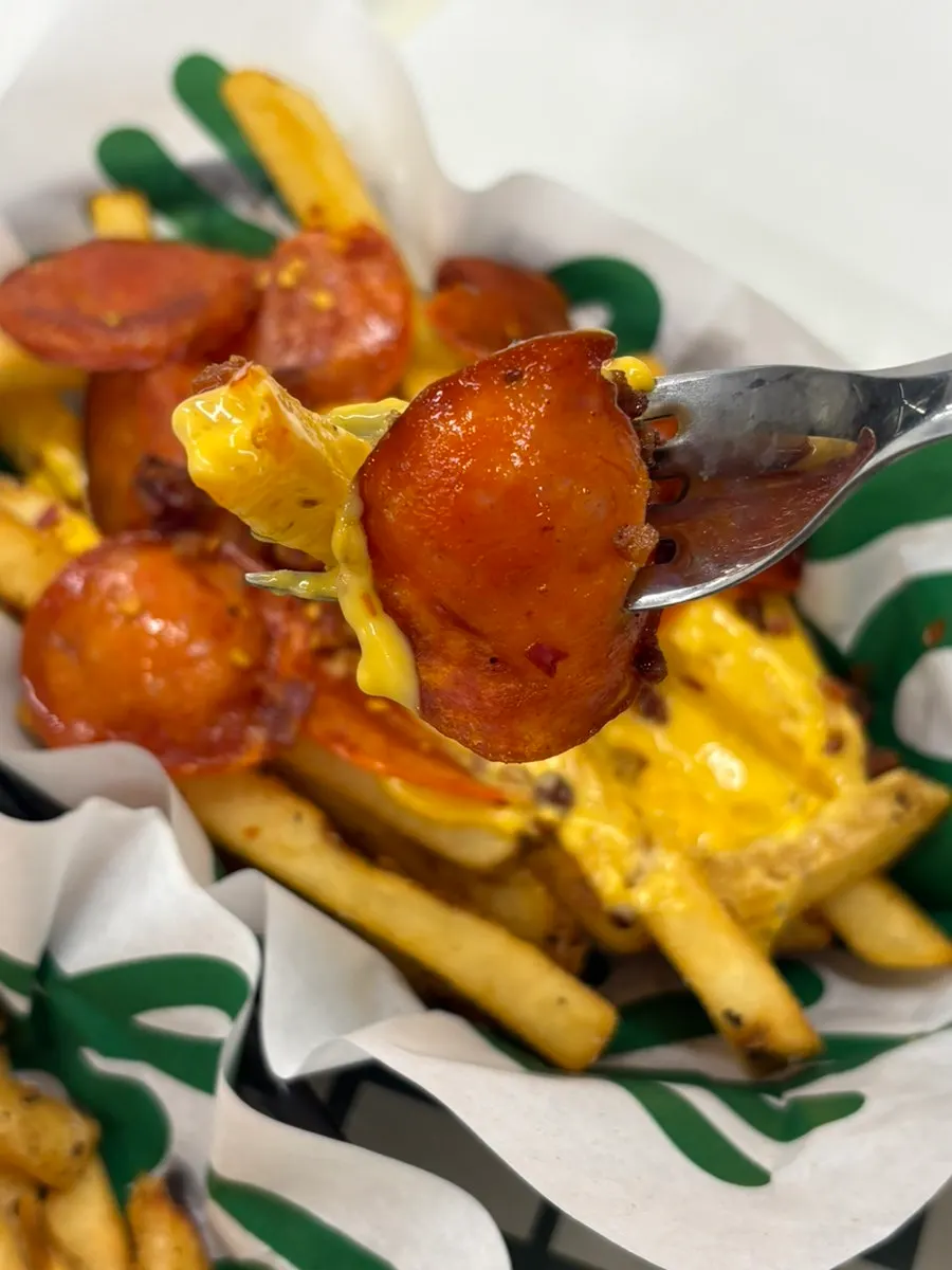 A plate of Pepperoni Cheese Fries