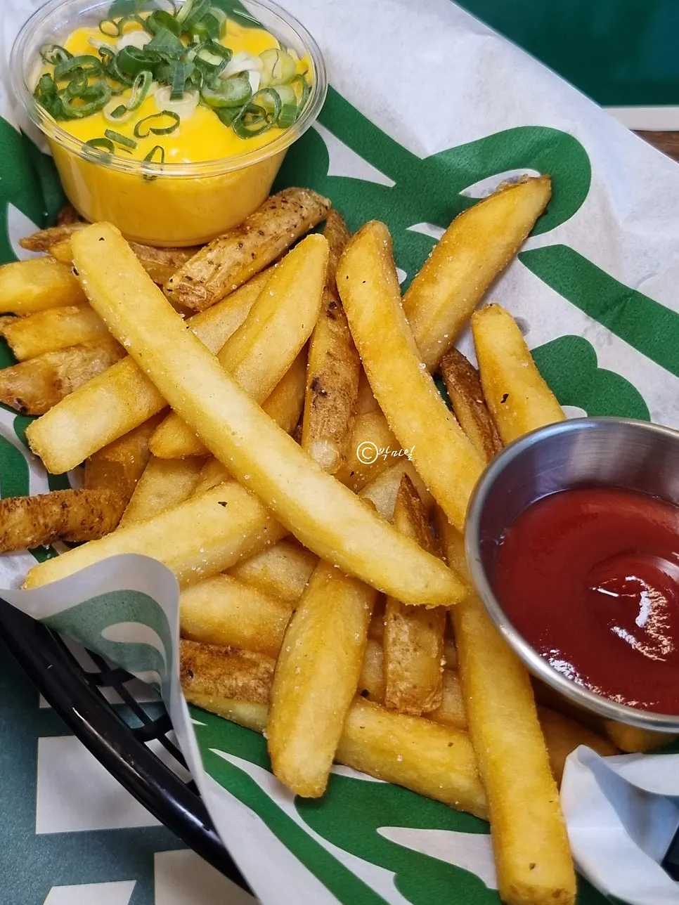 Original fries served with cheese sauce