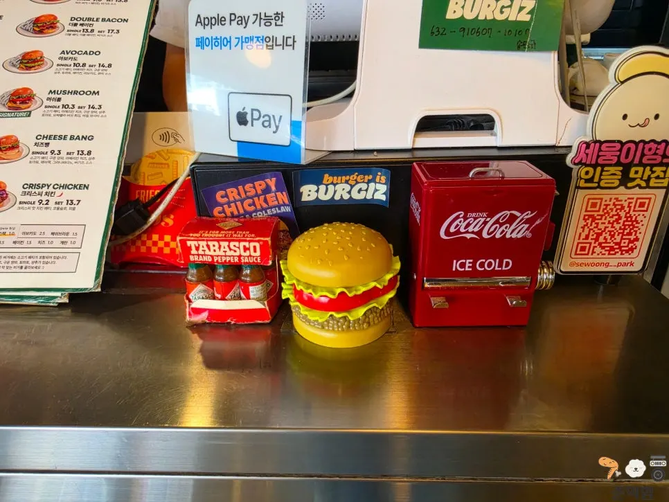 Burger-themed interior decorated with neon signs and signboards