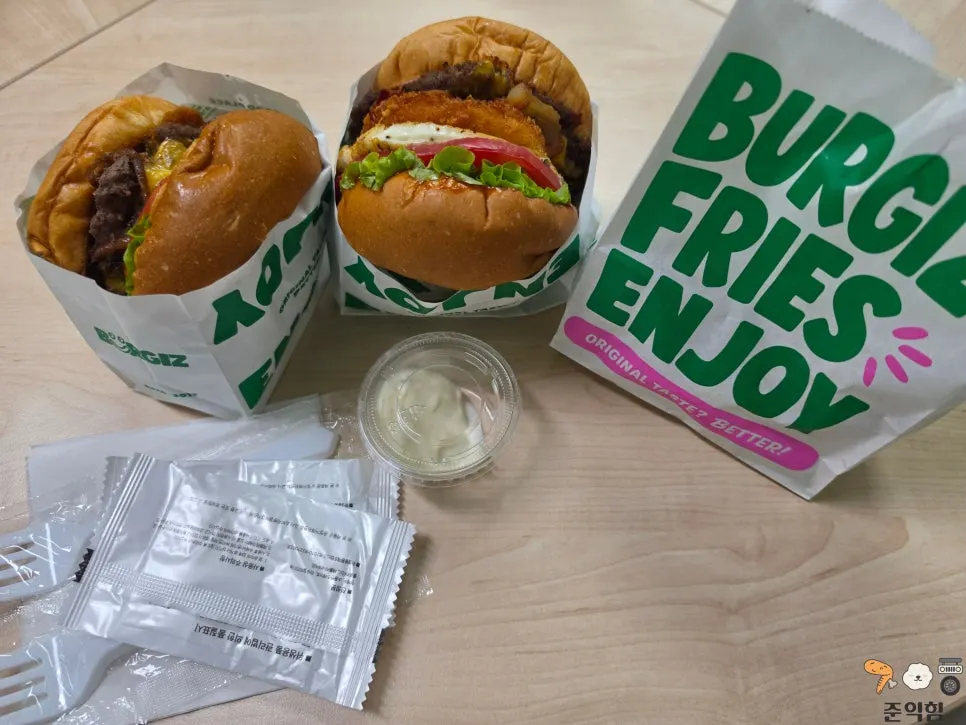 Takeout double cheeseburger, Hangover burger, and buffalo wings