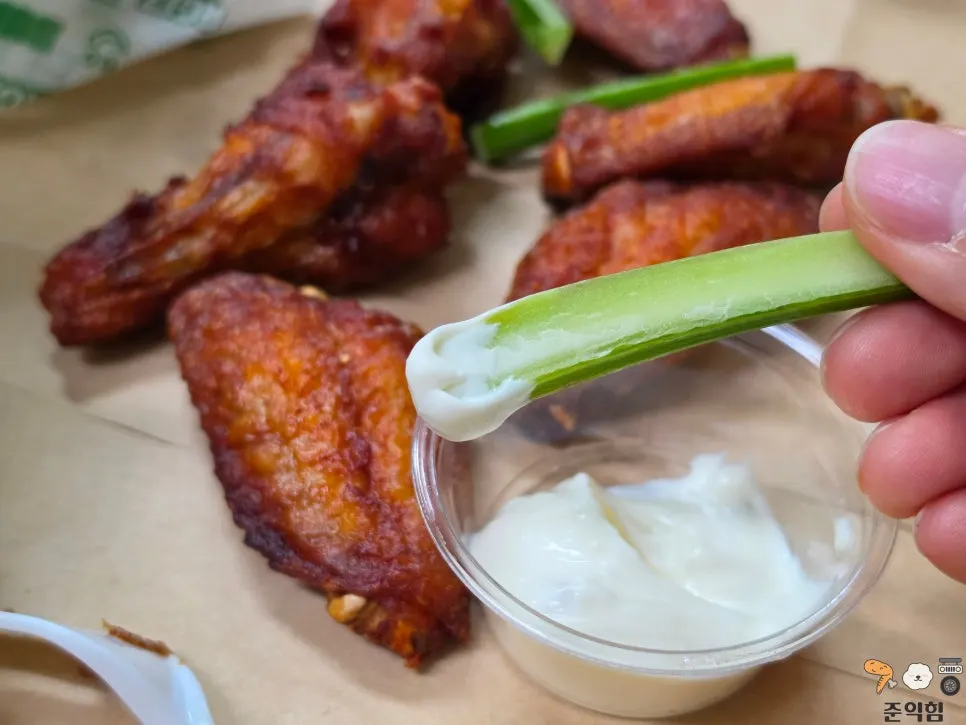 Celery served alongside the buffalo wings
