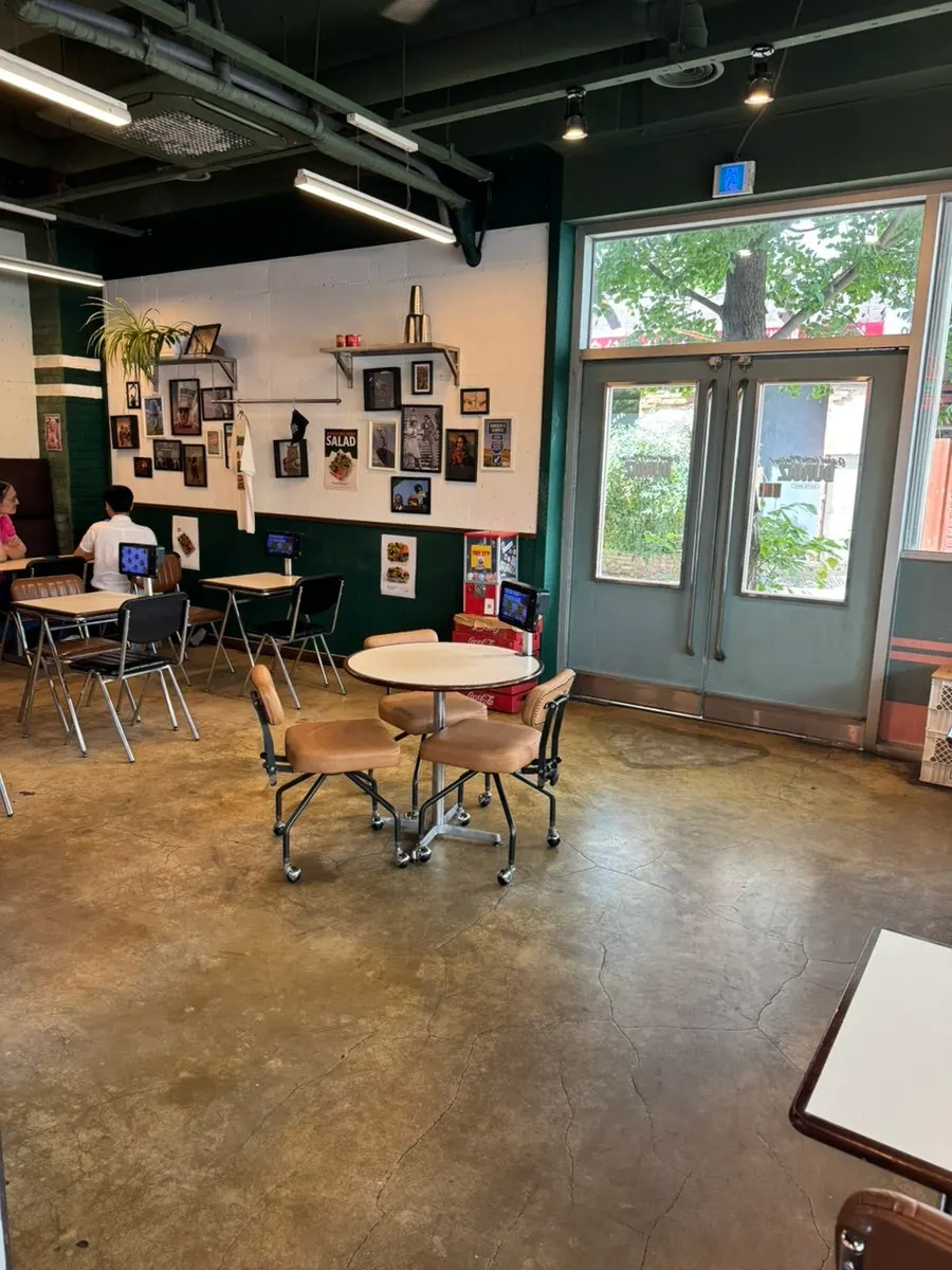 Well-spaced tables and seating at Buggies Tangbang