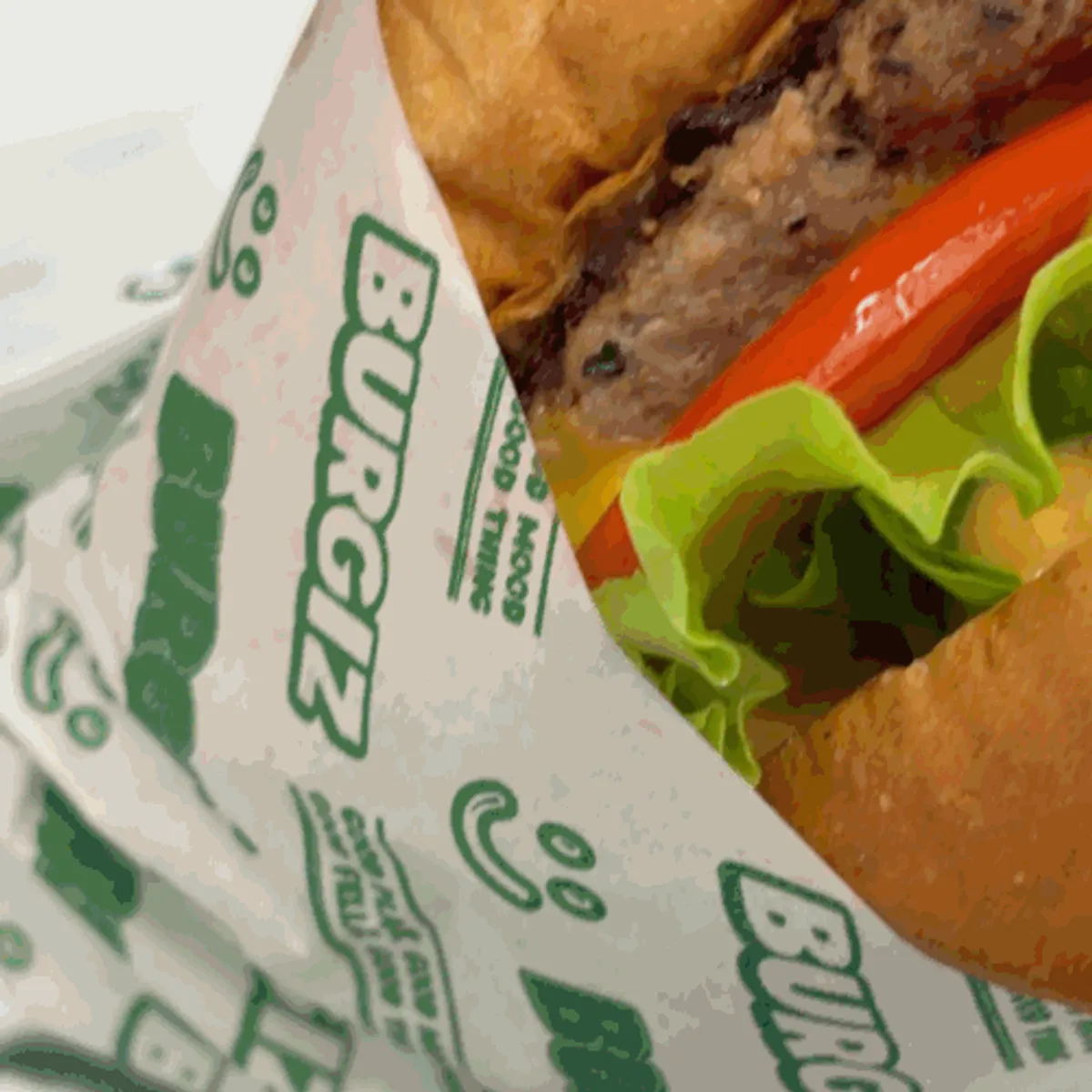 Cheese burger showing the 100% beef patty