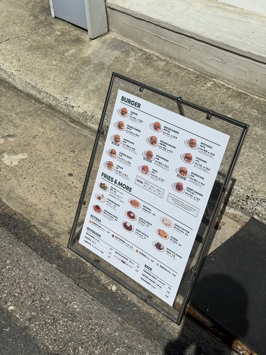 Menu board placed outside Burgiz Daeheung