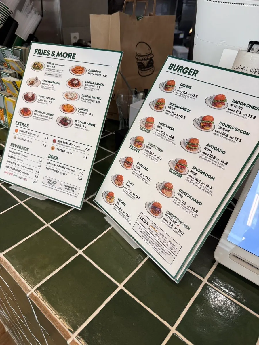 Counter and menu board at Burgiz Daeheung