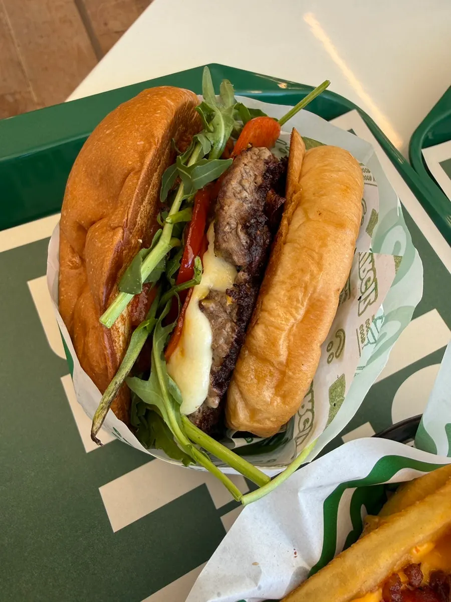 Chicago burger with pepperoni and arugula