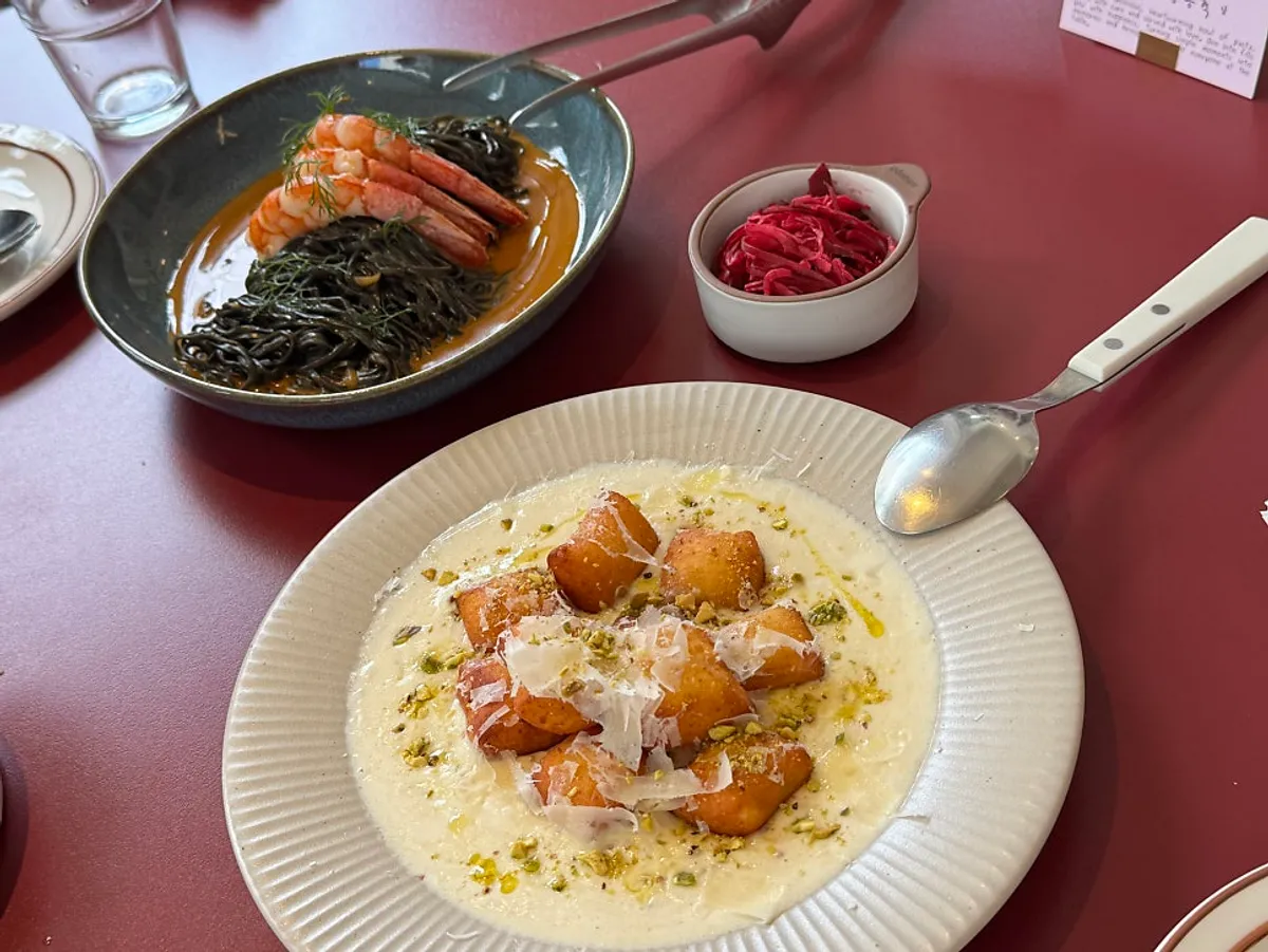 Bisque pasta and gnocchi bite served together at Burnish Resto