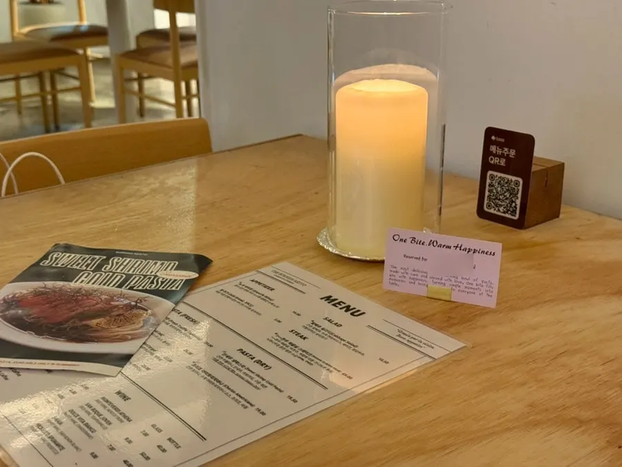 Table for two with reservation name placed on it