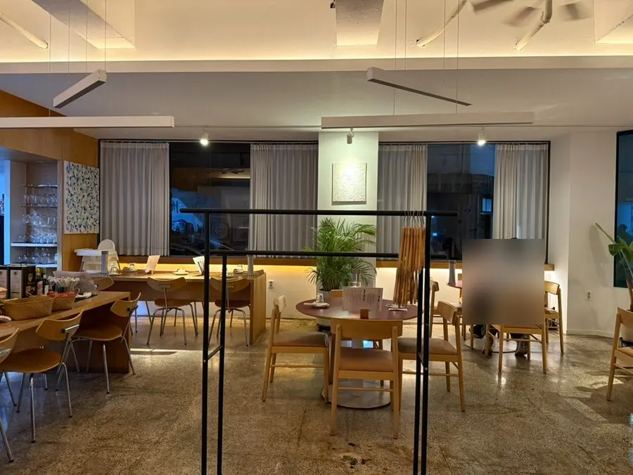 Seating layout in the main dining area of Burnish Resto