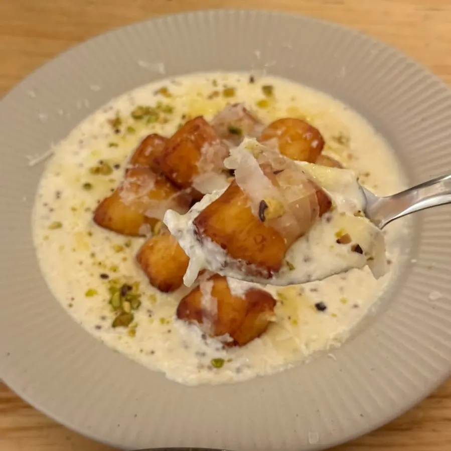 Handmade gnocchi bites with Comté cheese sauce