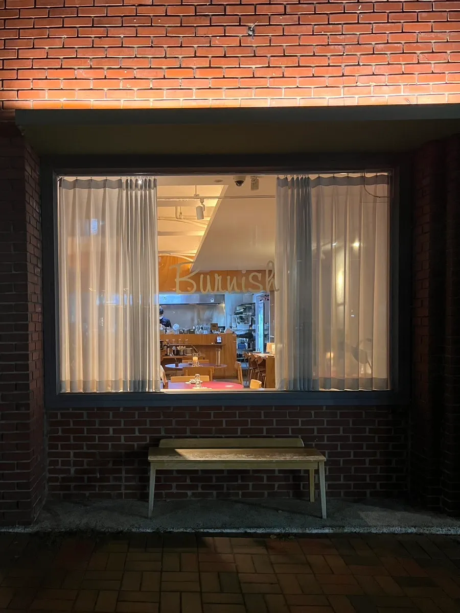 Entrance of Burnish Resto with parking space out front