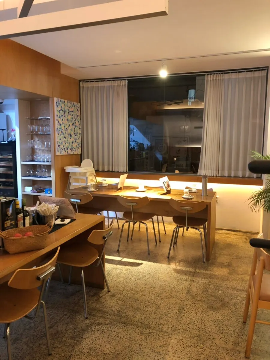 Burnish Resto dining hall seating with a year-end atmosphere