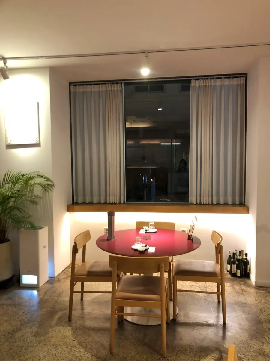 A cozy, separated-feeling table at Burnish Resto