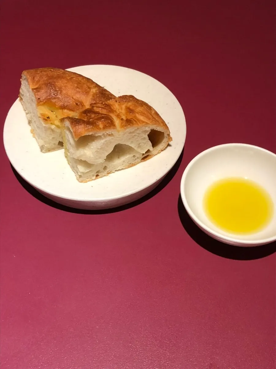 Focaccia bread served with olive oil