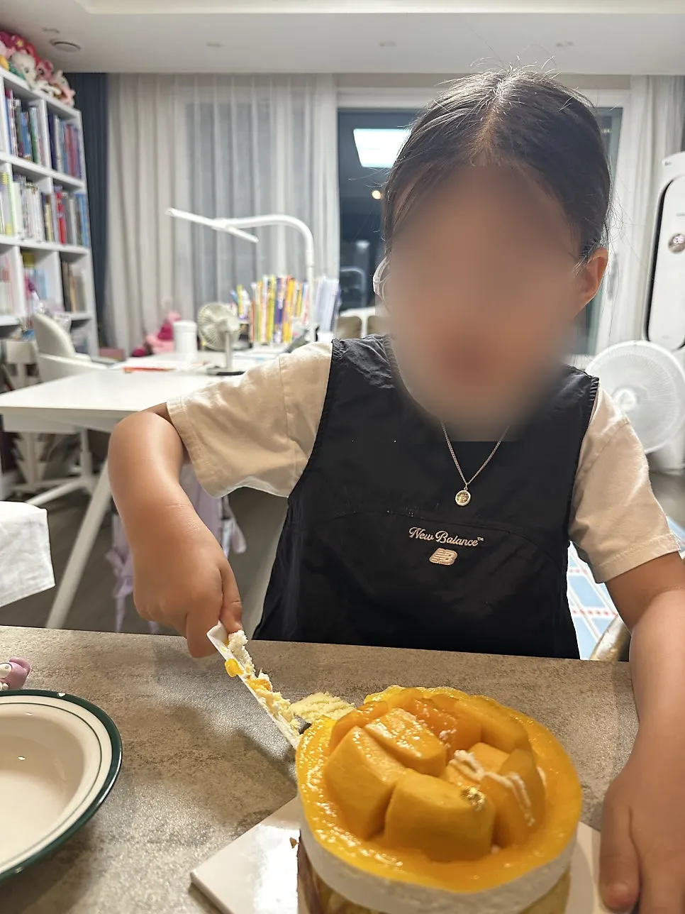 Mango cake cross-section with fresh cream