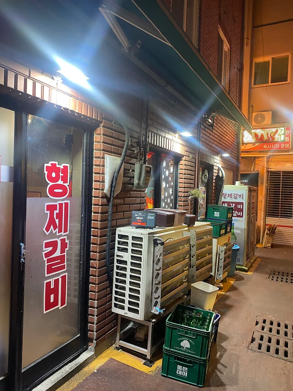 Narrow alley leading deeper into Choryang Galbi Alley