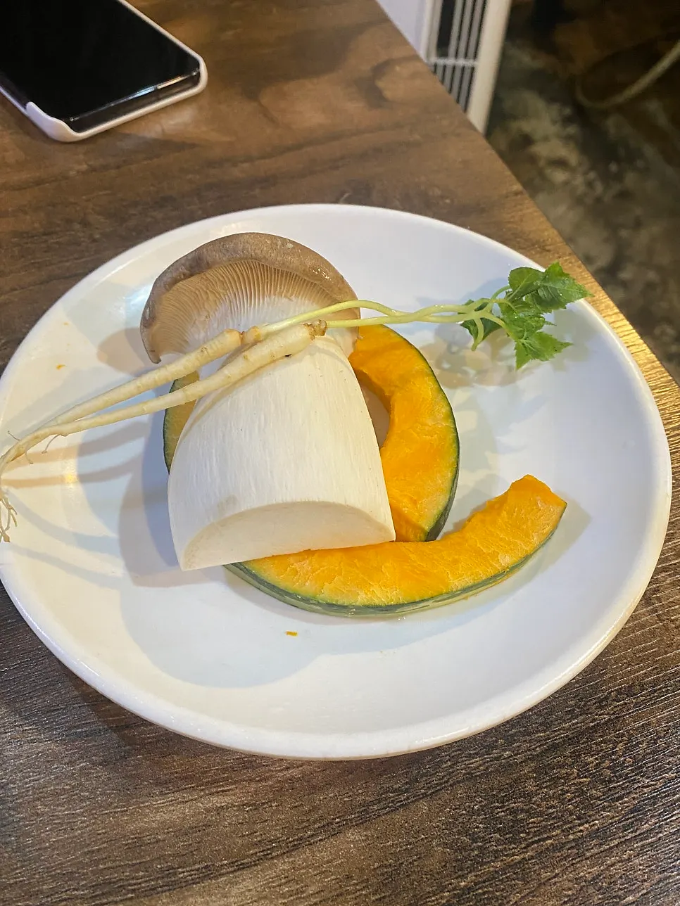 Homemade green onion kimchi served with meat