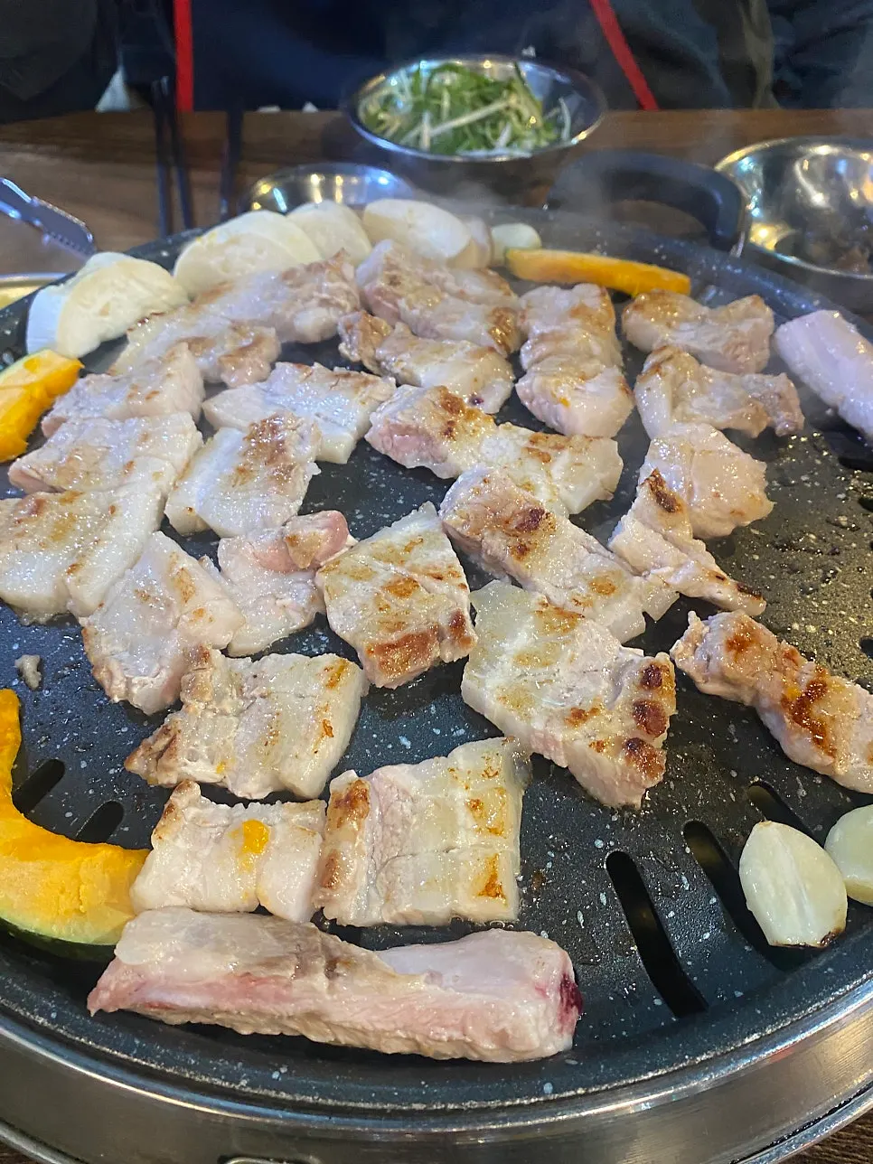 Fresh ribs grilled by a staff member