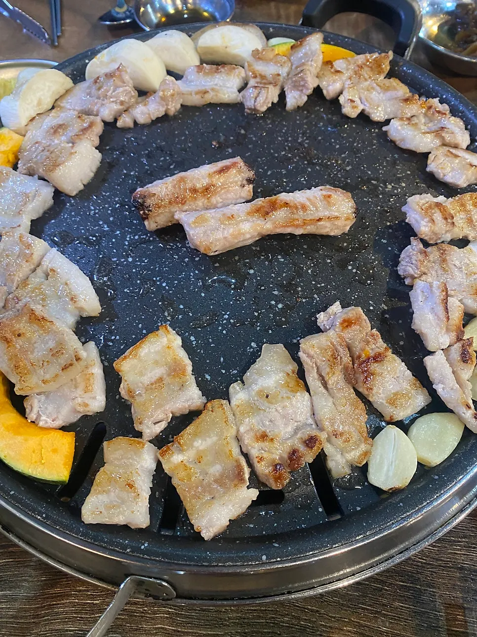 Fresh ribs grilling on the griddle
