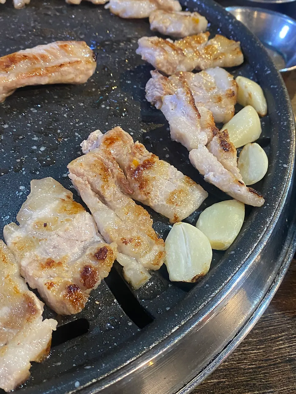 Fresh ribs sizzling as they cook