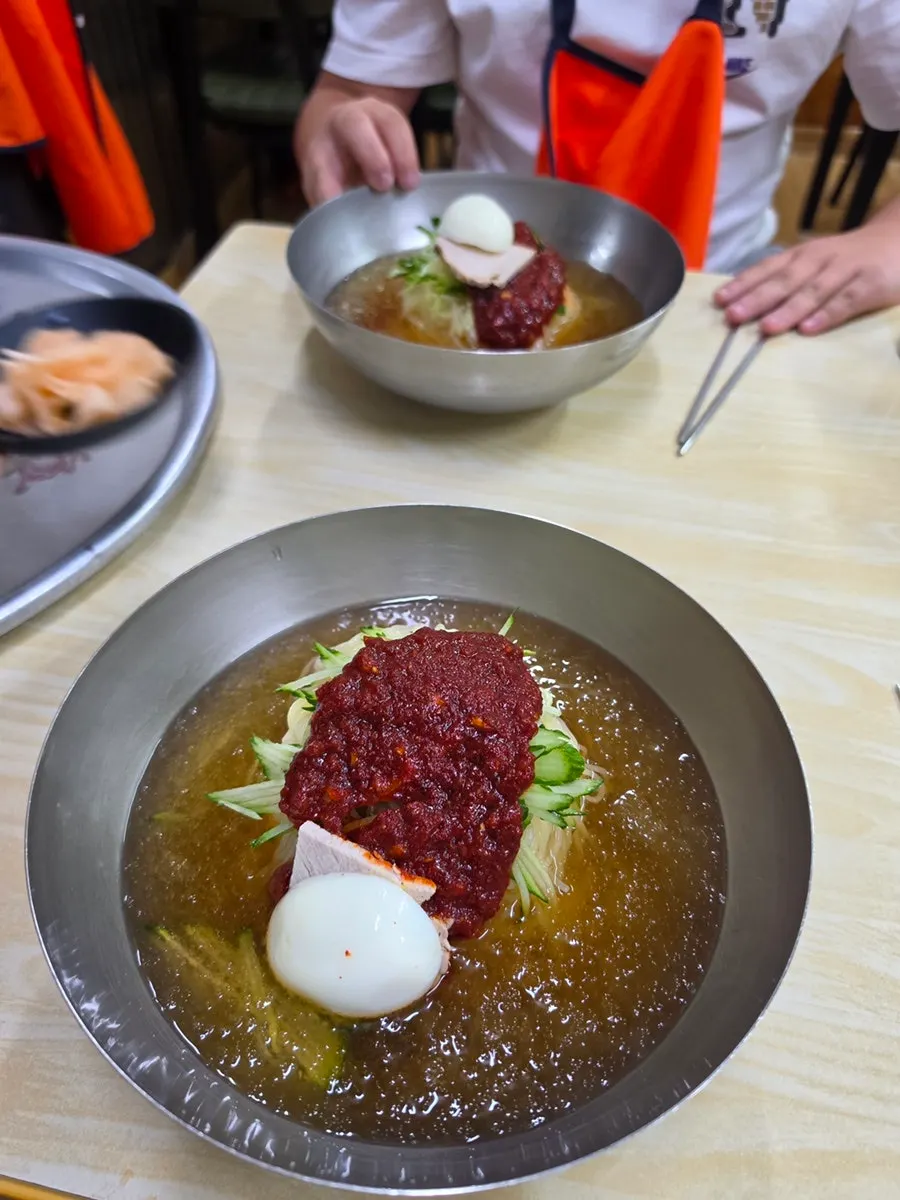 Hot broth enjoyed with milmyeon