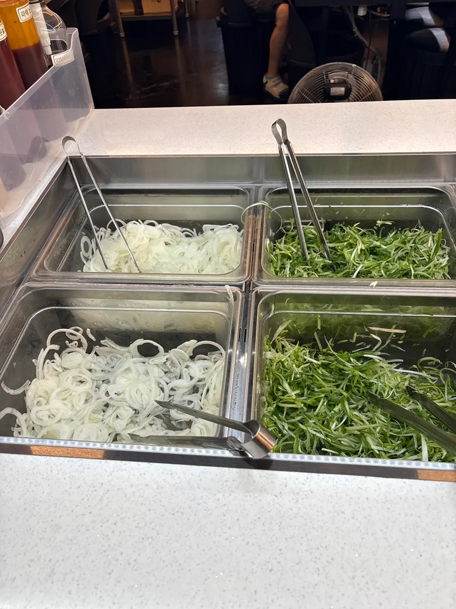 Odeng-tang broth on a Daepae Maket table
