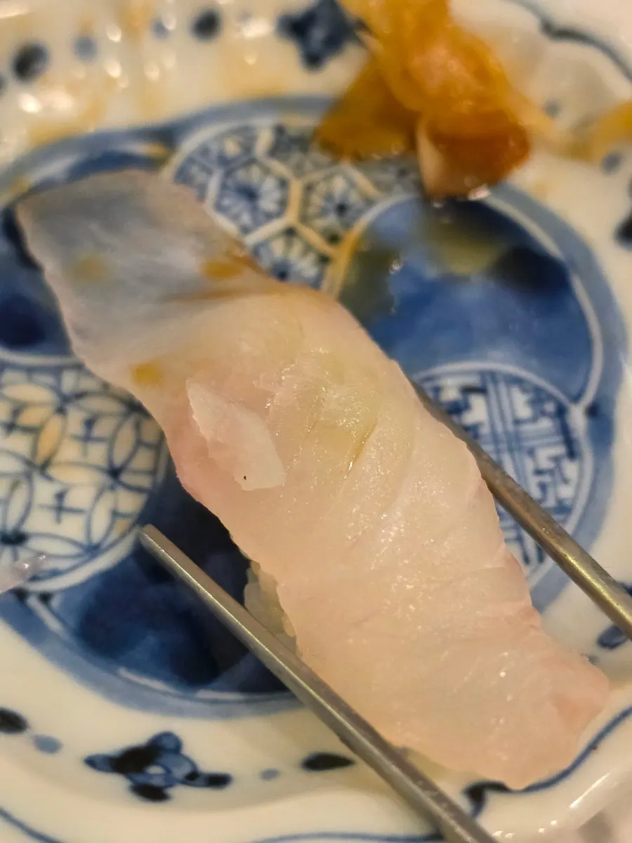 Flounder and shrimp sushi included in the set