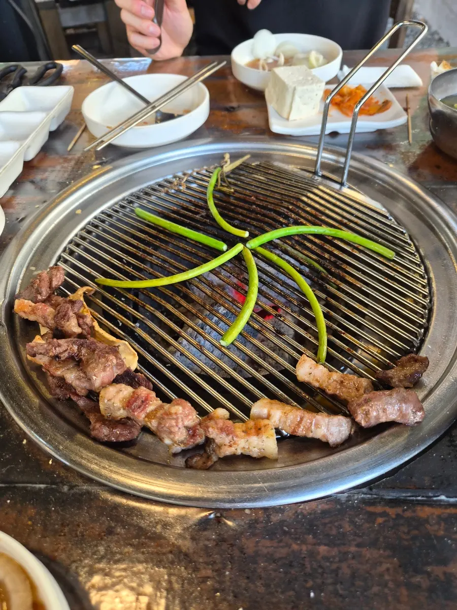 Plate of skewers including shrimp skewer
