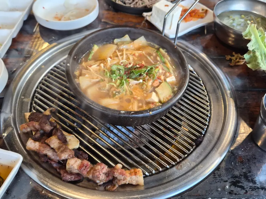 Table with doenjang jjigae and rice