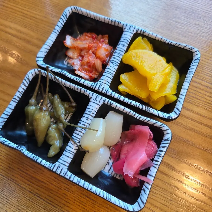 Clear soup, cream soup, and white rice at the self-serve bar