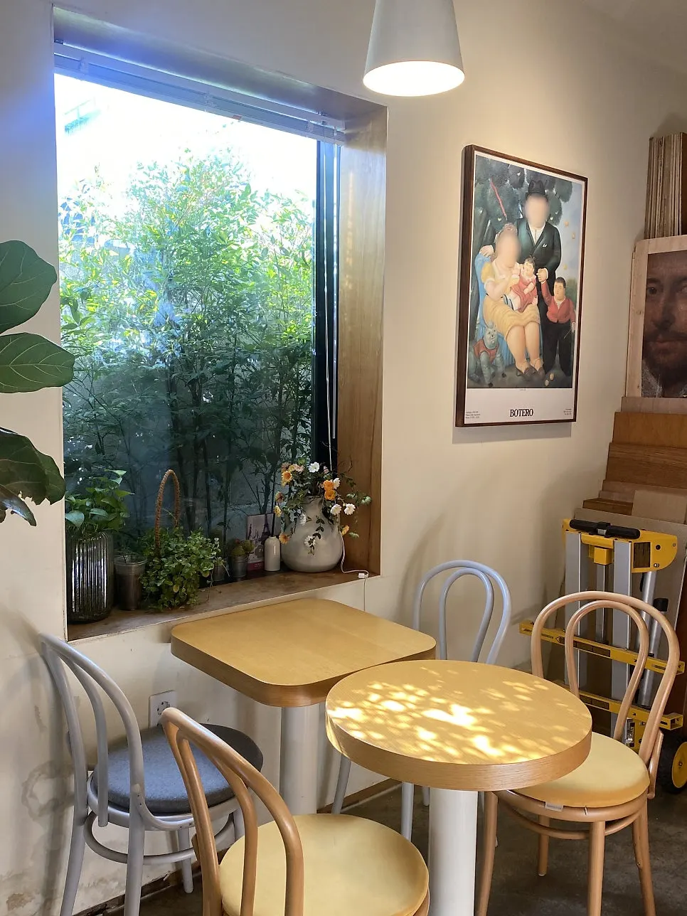 Tables and chairs inside Buajang