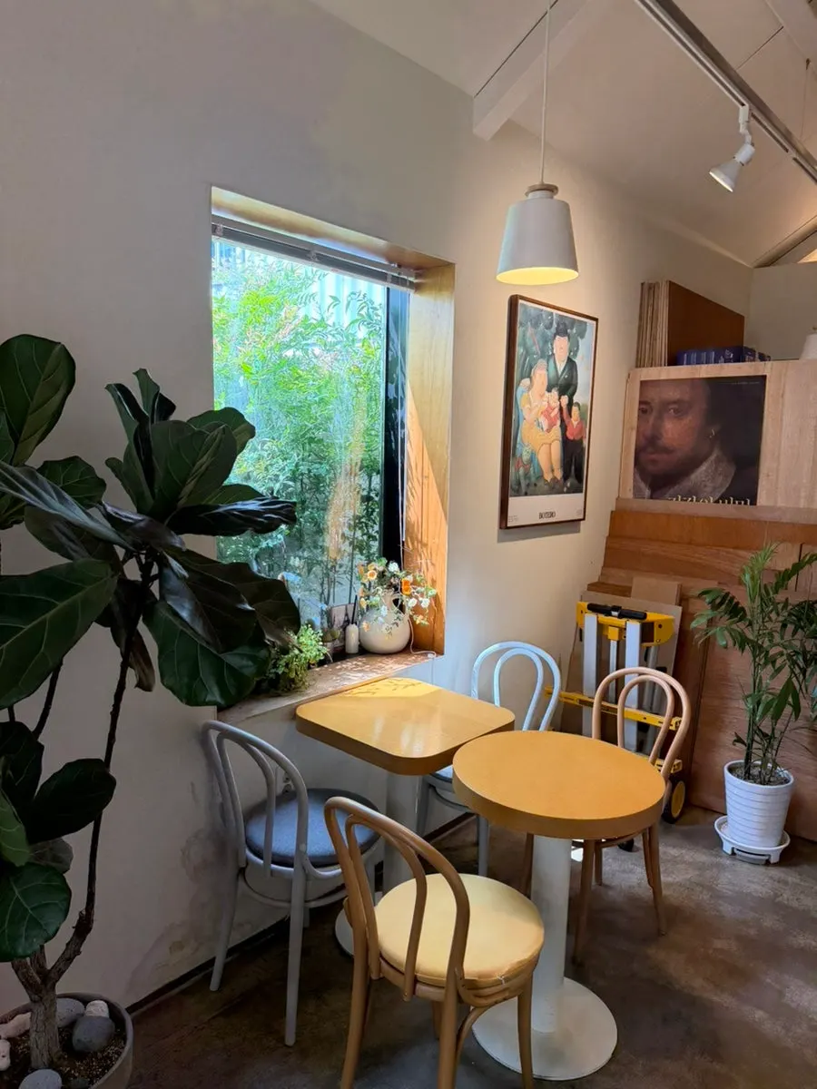 Café interior with cozy tones and soft lighting