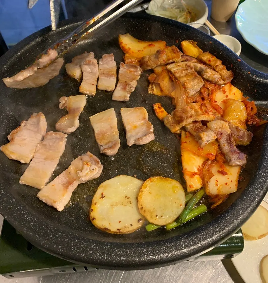 Grilled potatoes and pork-belly sides