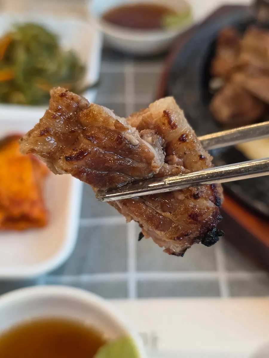 Marinated pork galbi served on a stone plate