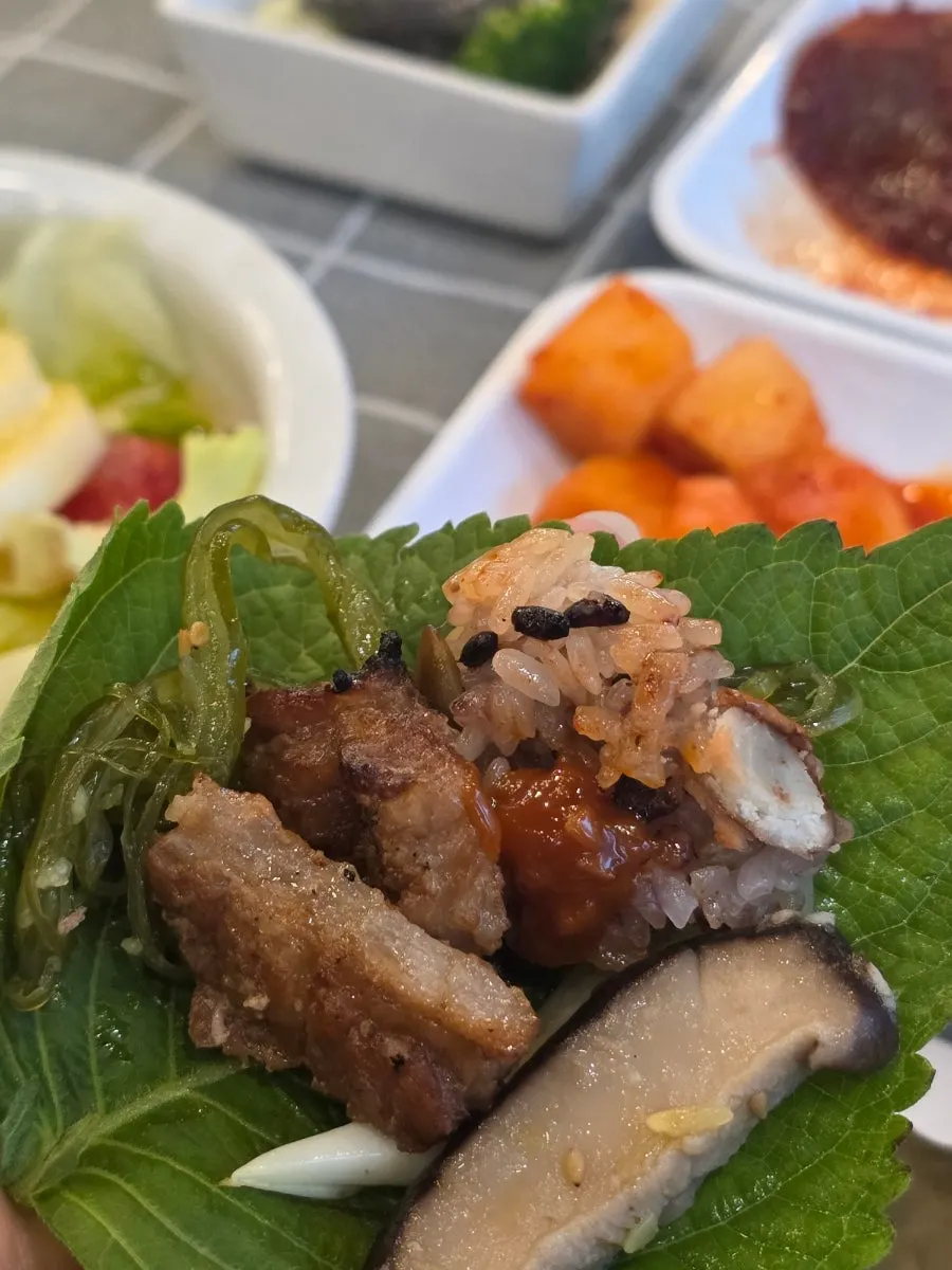 Marinated pork galbi served in a ssam wrap