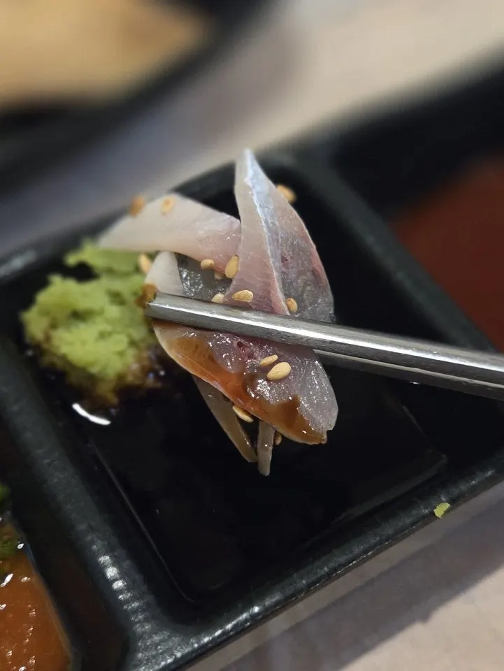 Finely sliced gizzard shad with shredded perilla leaf