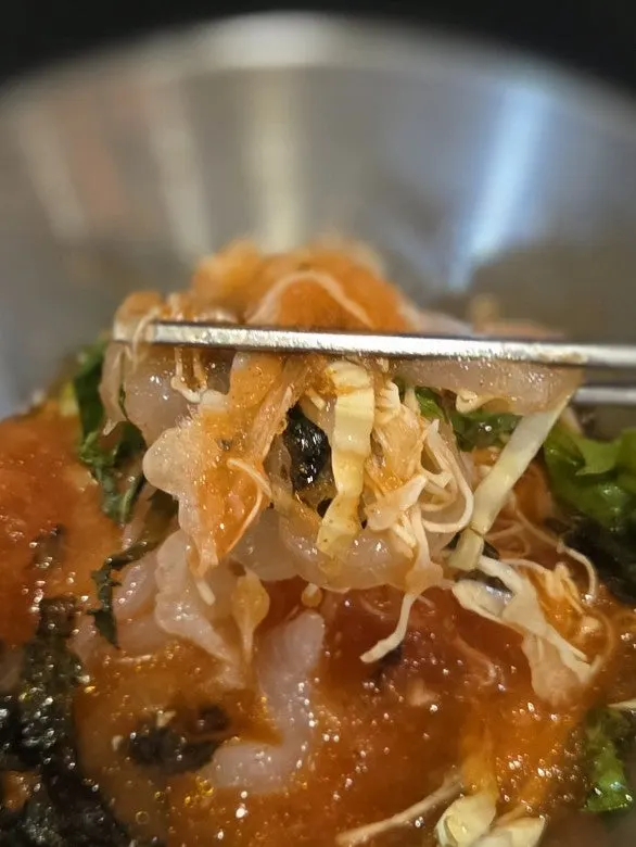 Sliced gizzard shad dipped in makjang