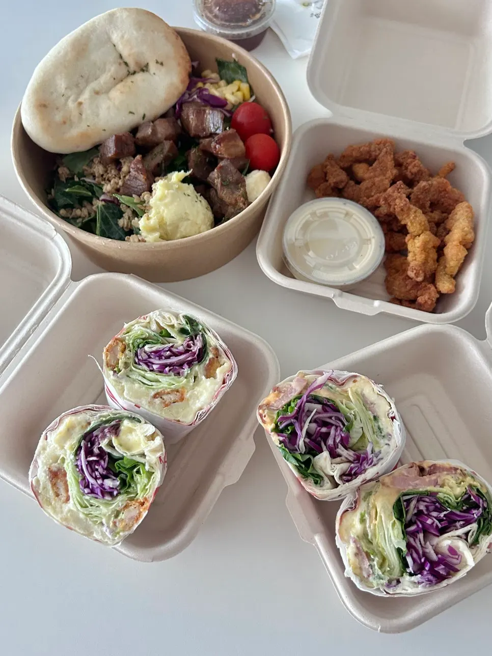 The four takeout items packed from PARENTS Coffee & Salad