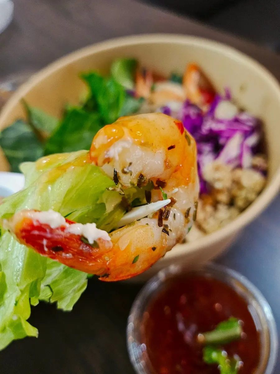 Seasoned shrimp salad takeout container