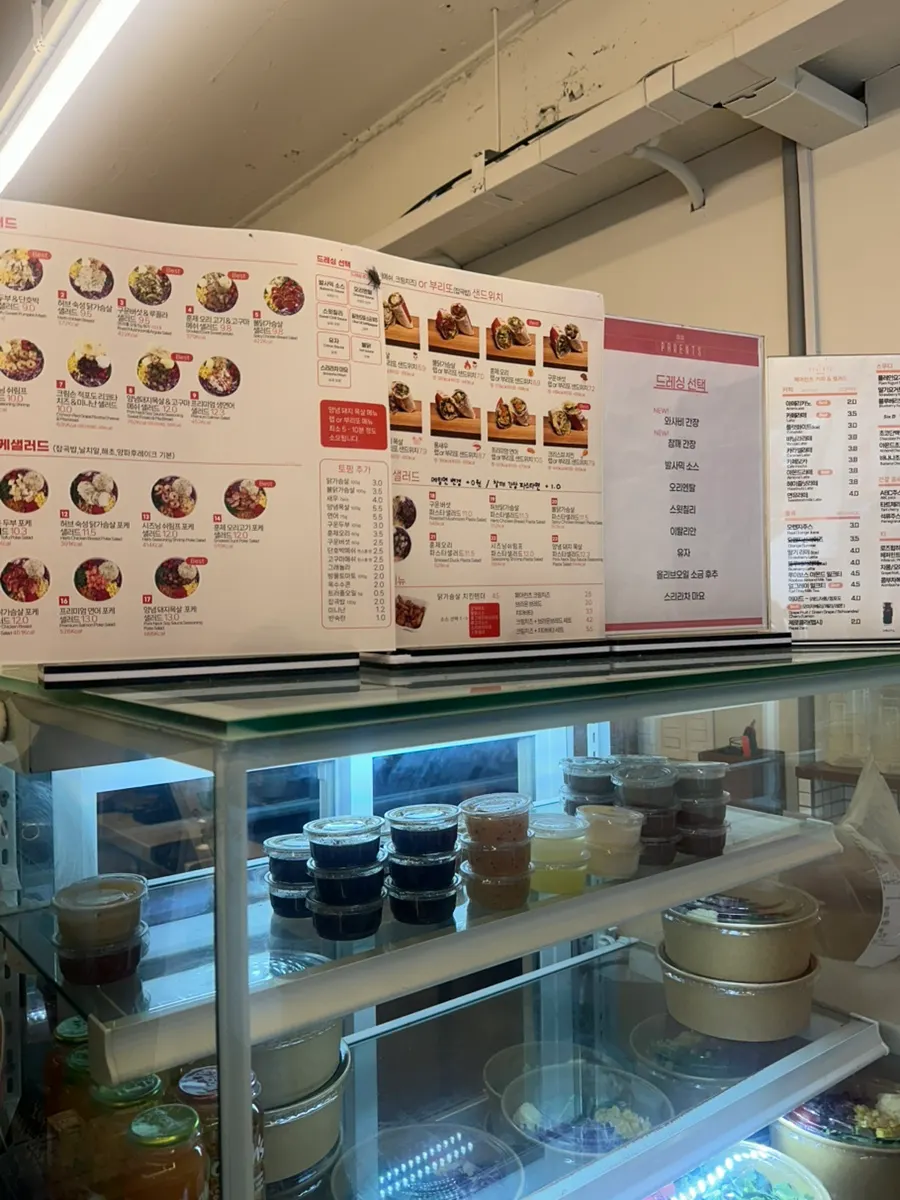 Menu listing salad and poke options
