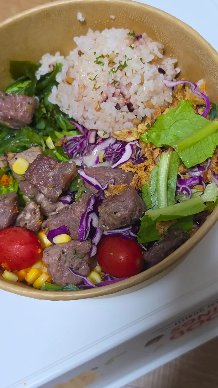 Beef flap steak poke with brown rice and vegetables