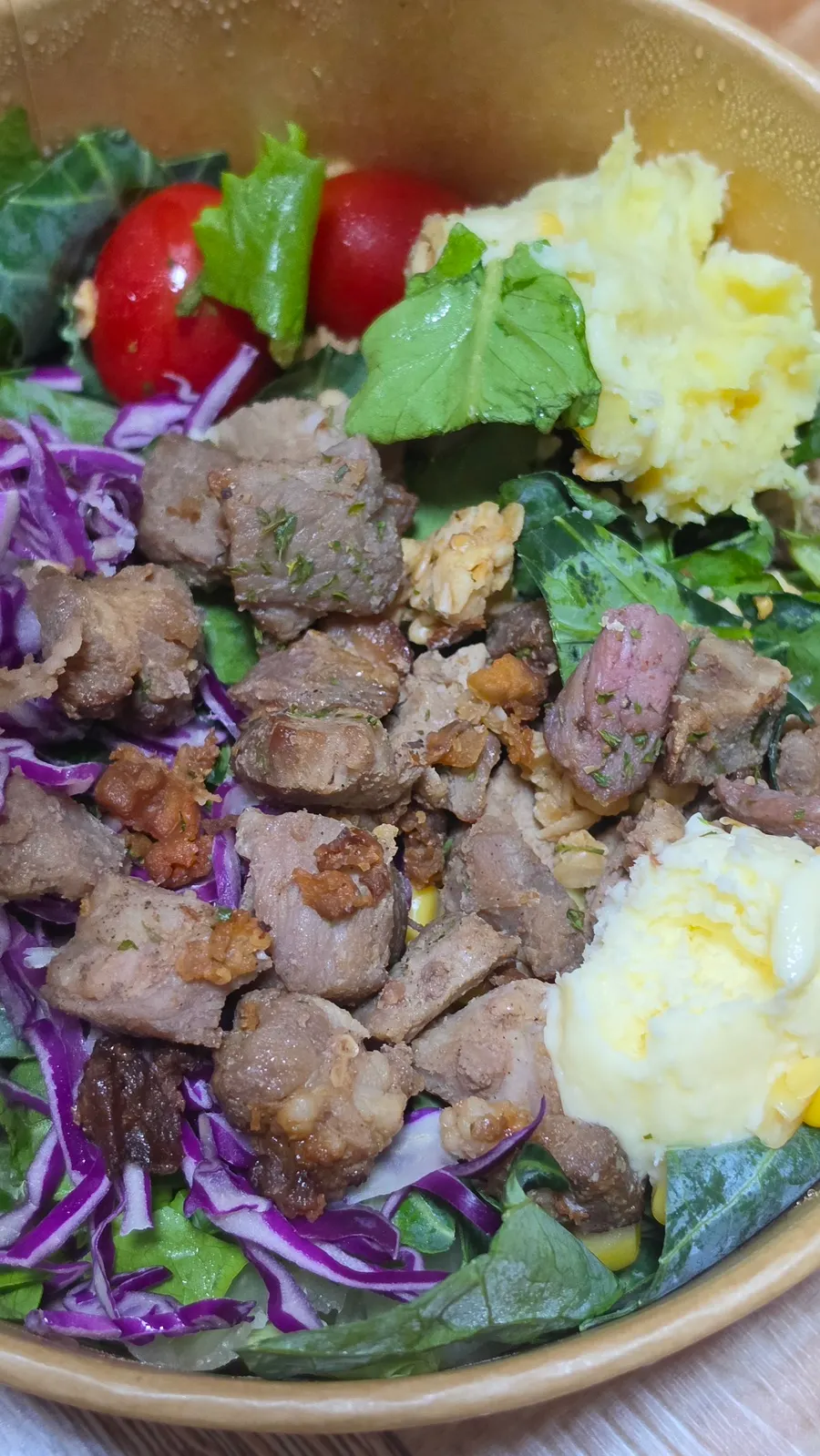 Seasoned pork and sweet potato mash plated together