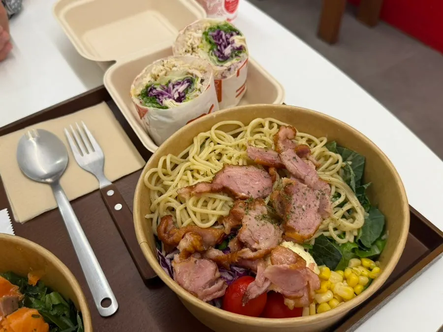 Poke and salads ordered by a family