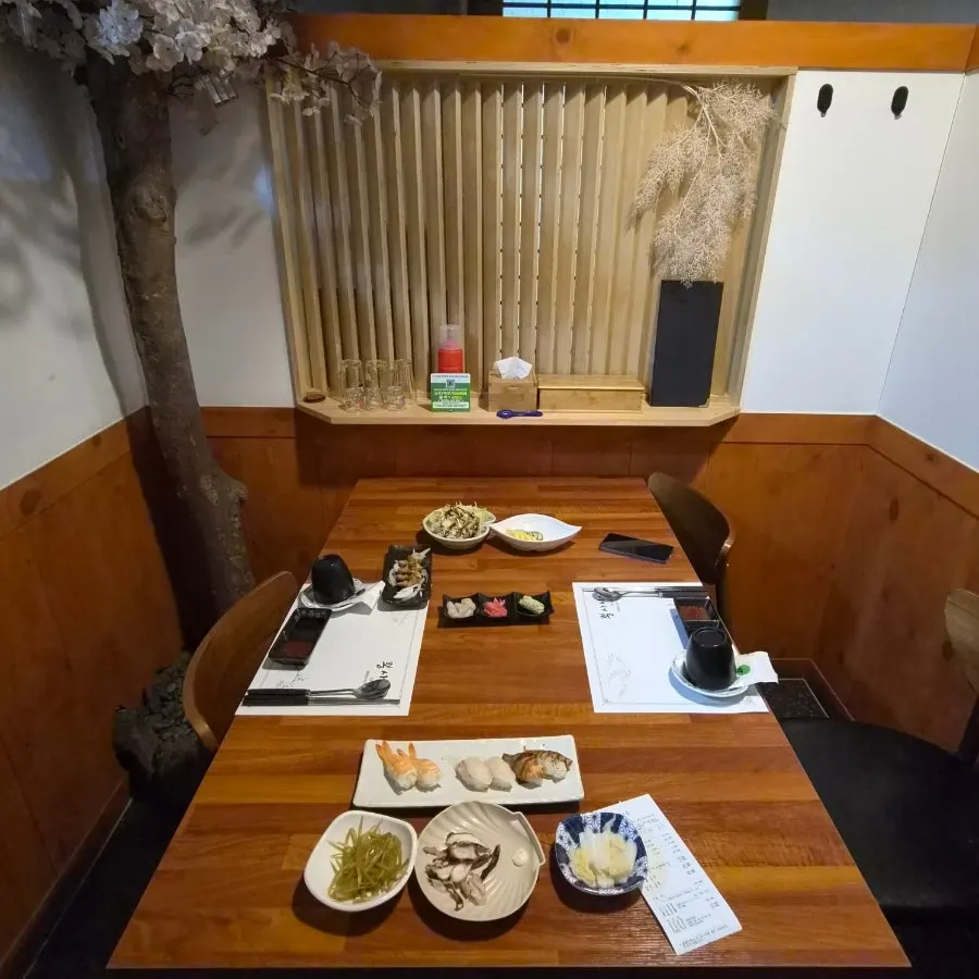 Ppong Sashimi interior signatures and high chair