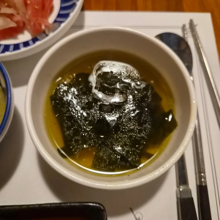 Sushi and rolled omelet side-dish spread