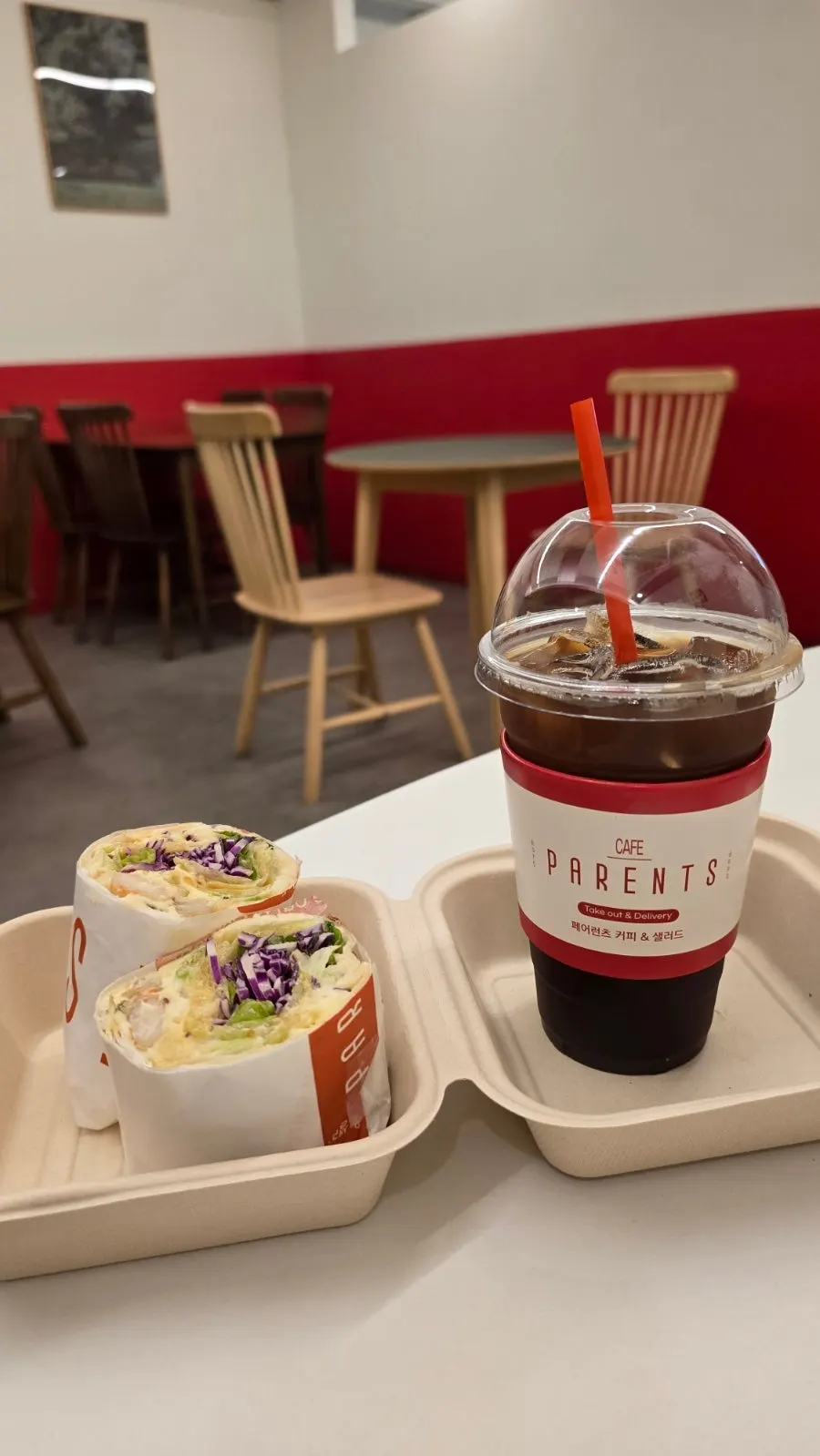 A meal of wraps and poke salad